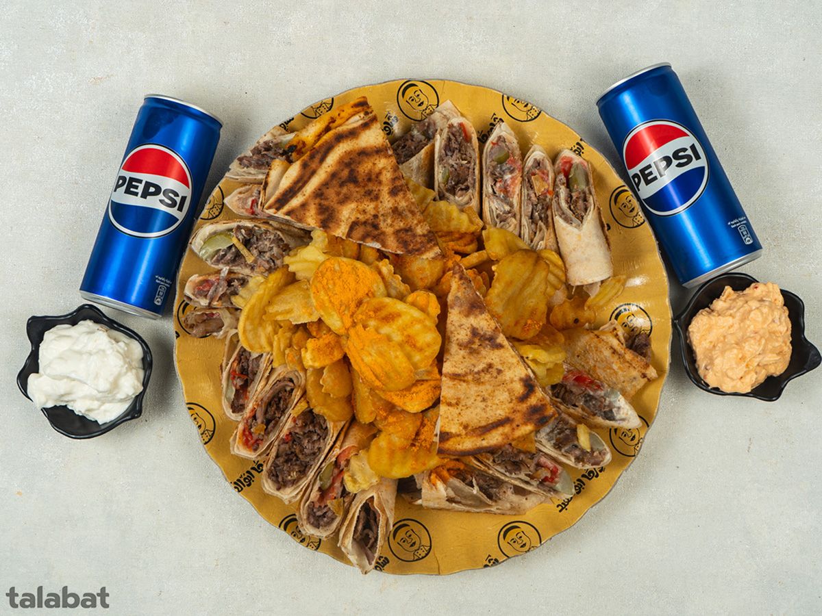 Family Meat Meal With Pepsi Can